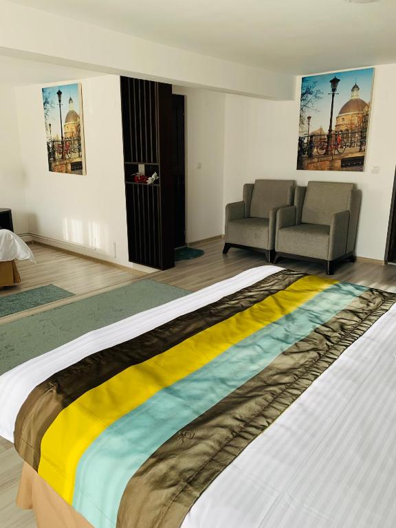 Postel nebo postele na pokoji v ubytování Casa Lazar