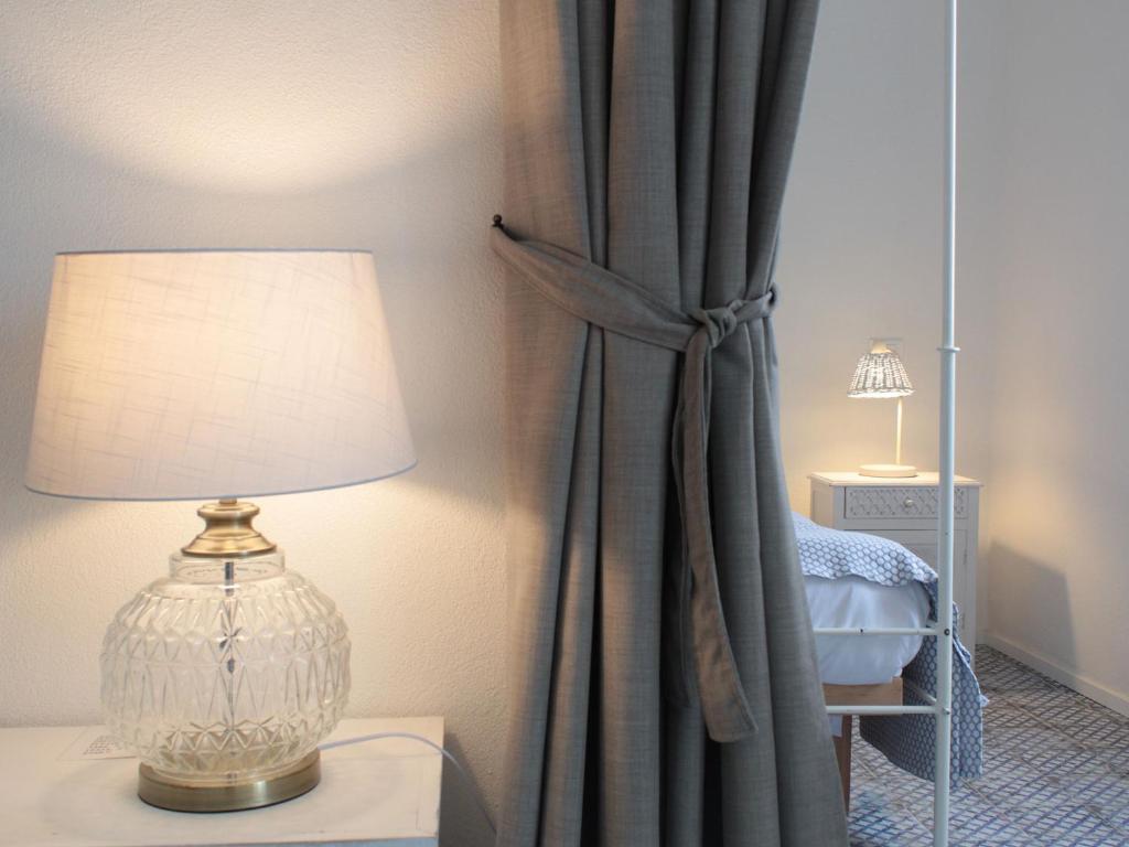 A bed or beds in a room at Home de mar