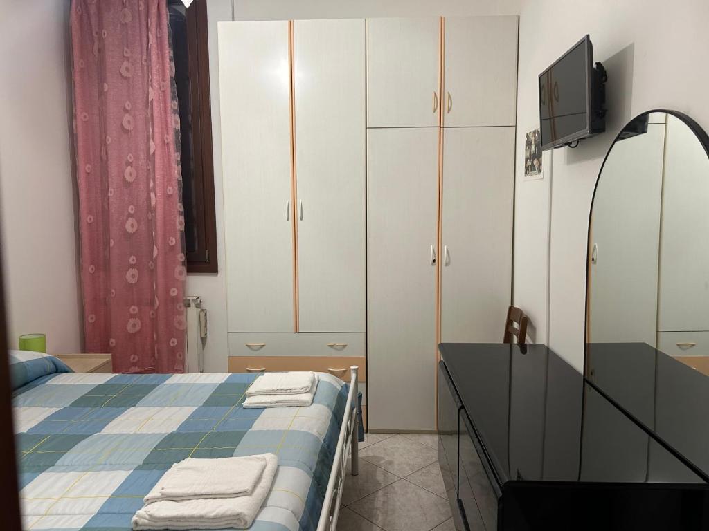 Postel nebo postele na pokoji v ubytování CA, BOTTE
