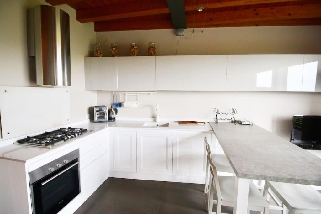 Kuchyň nebo kuchyňský kout v ubytování Vigne di Scanzo