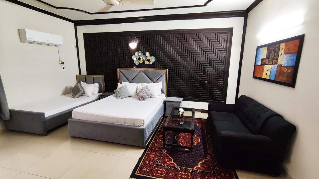 Aleph Islamabad Guest House - Deluxe Double Room (2 Adults + 1 Child)