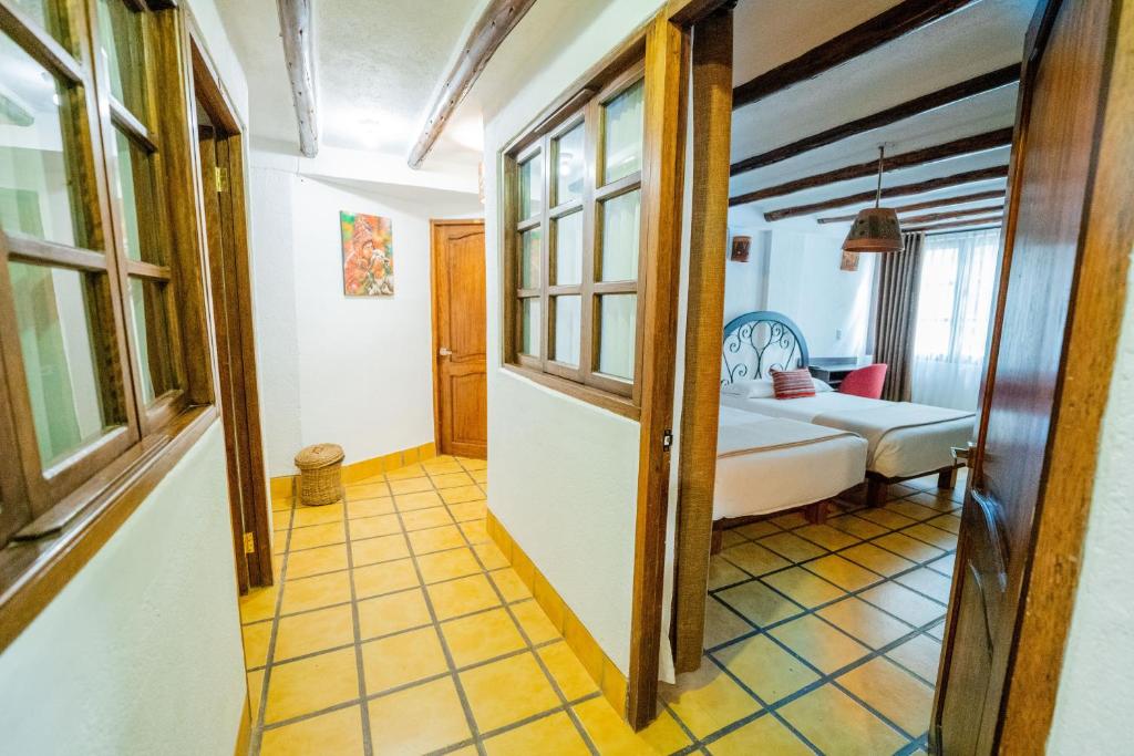 Postel nebo postele na pokoji v ubytování Vilas Insight Hotel Machupicchu