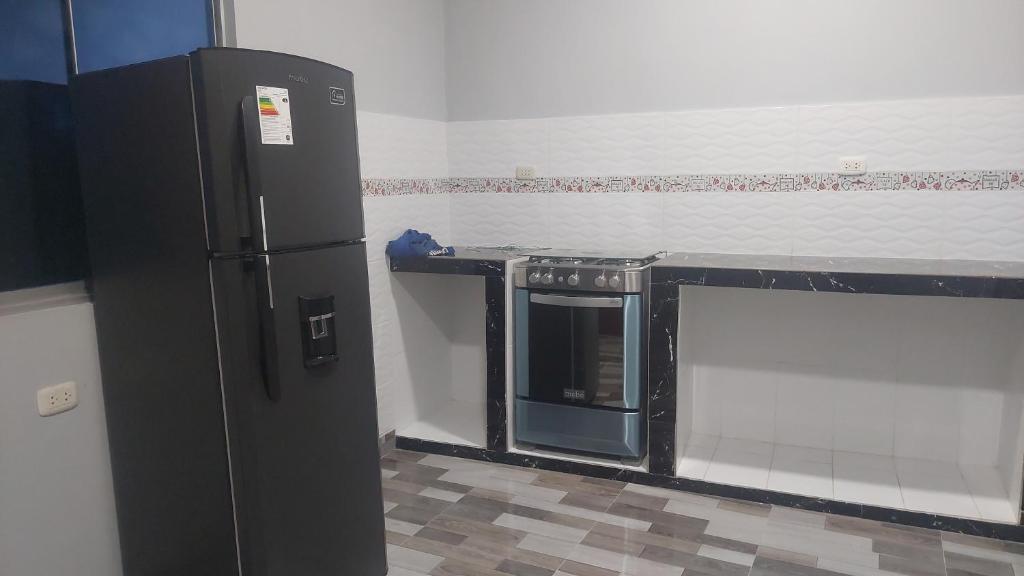 Kuchyň nebo kuchyňský kout v ubytování Casa Alojamiento Picuro Lodgind