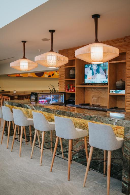 TV a/nebo společenská místnost v ubytování Gran Hotel Concordia