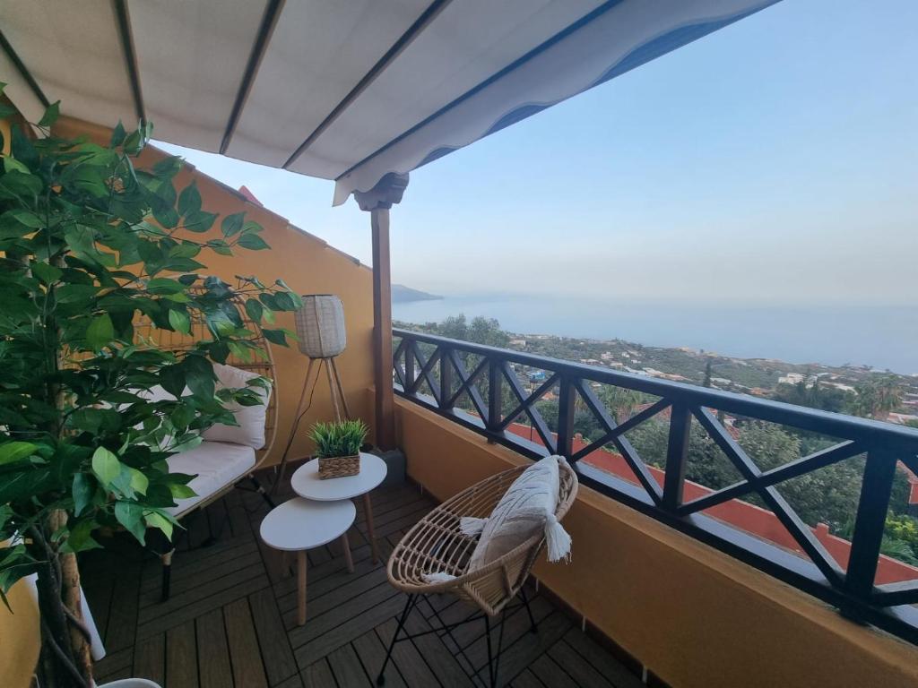 En balkon eller terrasse på Apartamento Sweet Aroma