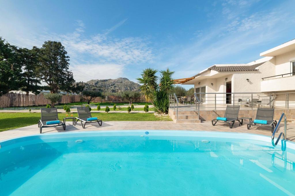Bazén v ubytování Sugar View Villa In Kolymbia nebo v jeho okolí