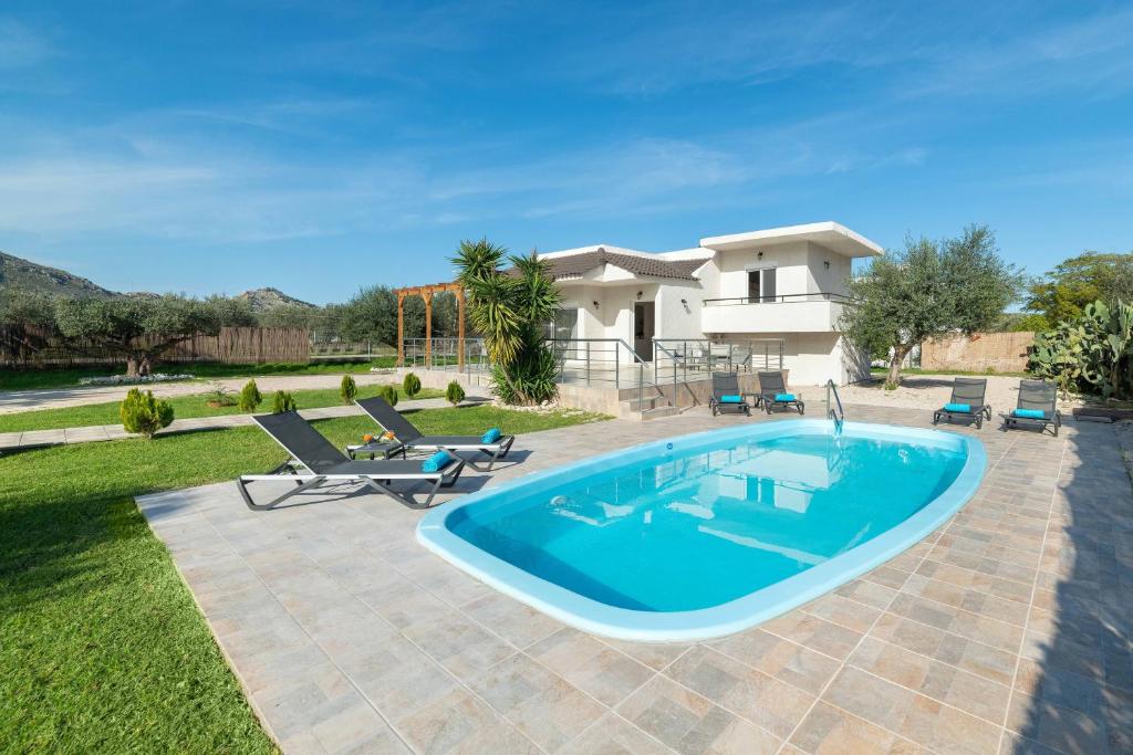 Bazén v ubytování Sugar View Villa In Kolymbia nebo v jeho okolí