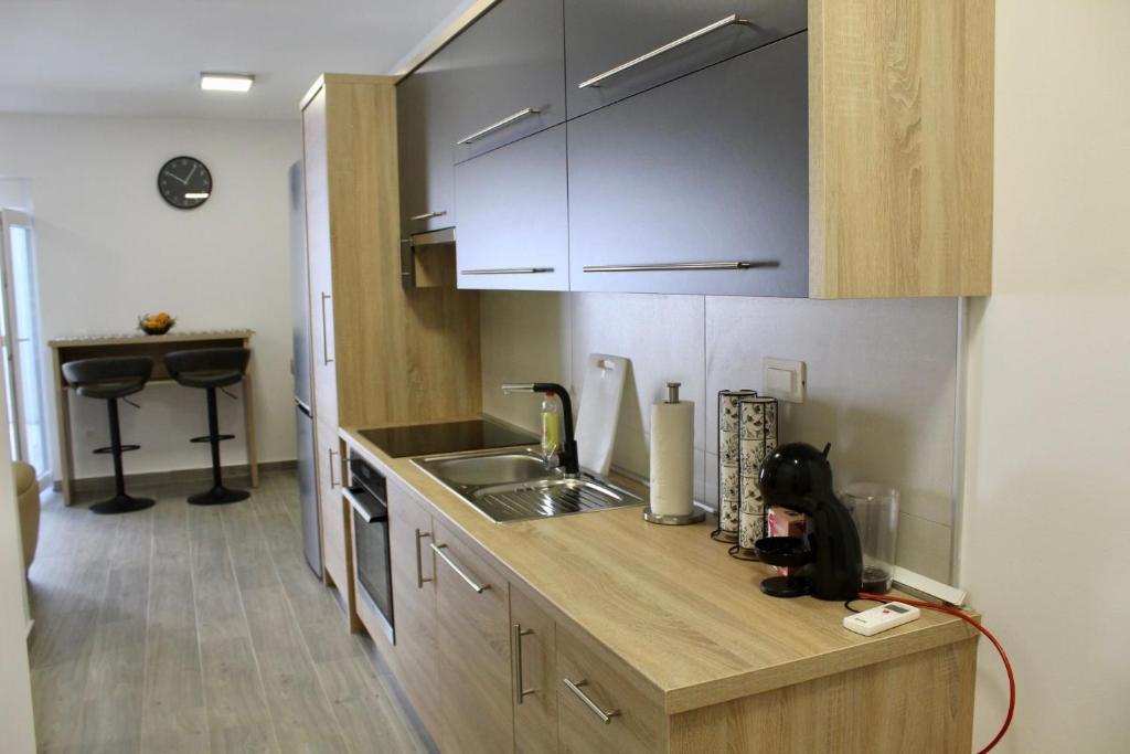 Kuchyň nebo kuchyňský kout v ubytování Apartman Kristina