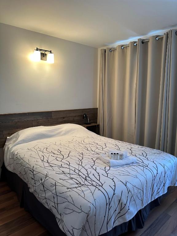 Postel nebo postele na pokoji v ubytování Auberge Morritt