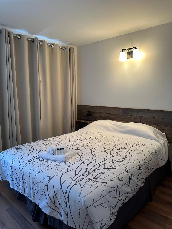 Postel nebo postele na pokoji v ubytování Auberge Morritt