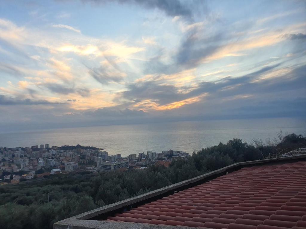 a view of the ocean from a roof of a building at Guest House Perazić in Bar