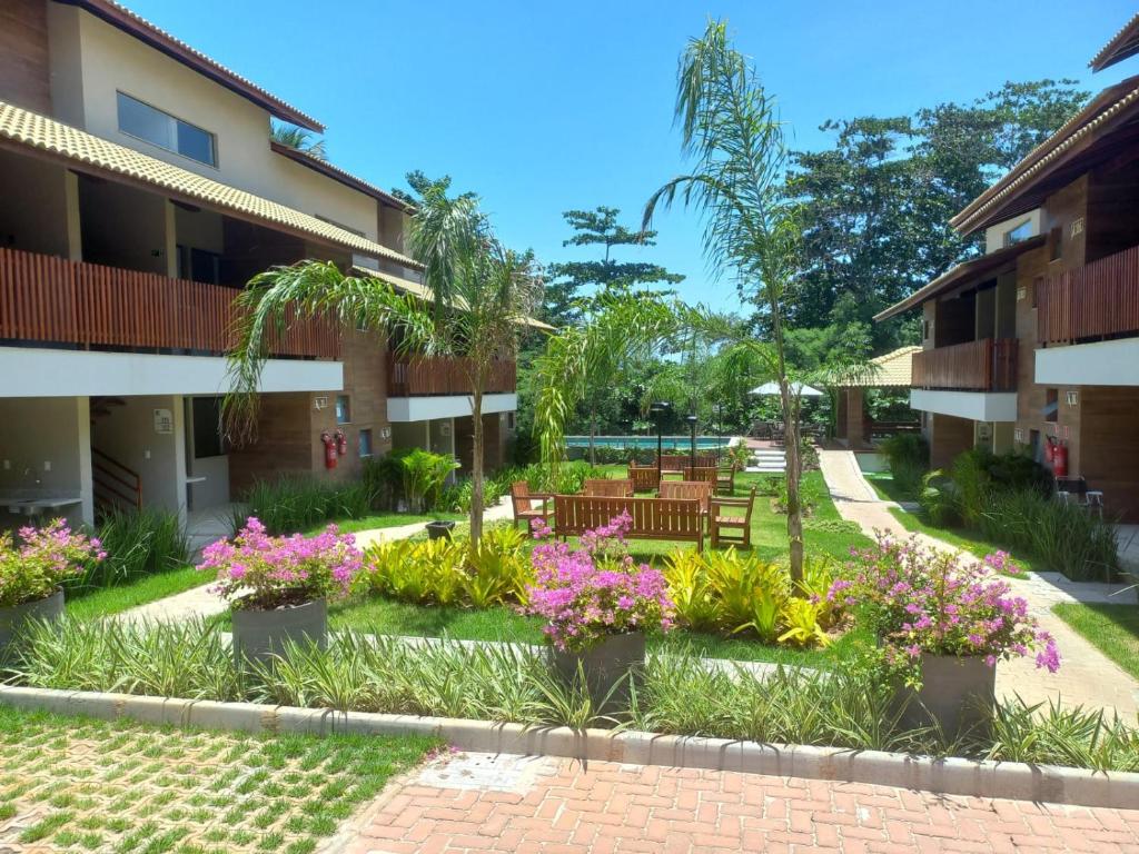 Κήπος έξω από το TIE RESIDENCIAL GUARAJUBA BA