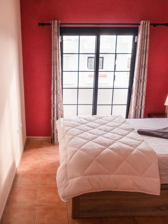 Postel nebo postele na pokoji v ubytování Coco Surfhouse - Coworking Coliving