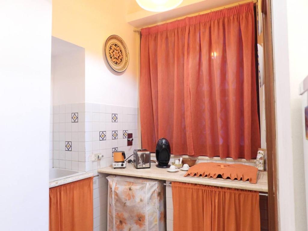 Kuchyň nebo kuchyňský kout v ubytování B&B Maria Piddu
