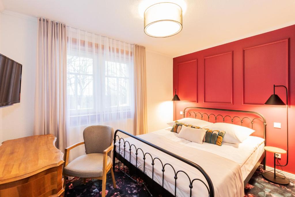 Postel nebo postele na pokoji v ubytování Hotel Zum Pfeiffer