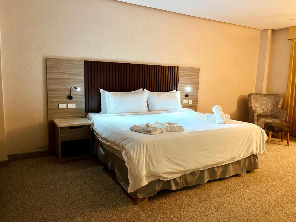 Katil atau katil-katil dalam bilik di Hotel Juniotel