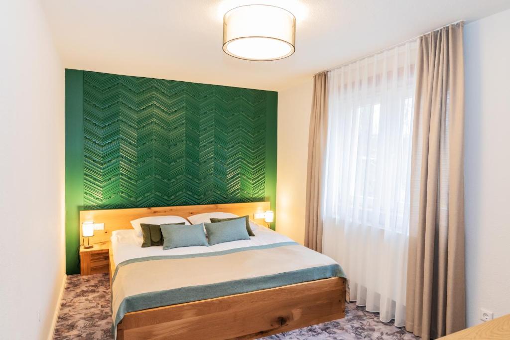 Postel nebo postele na pokoji v ubytování Hotel Zum Pfeiffer