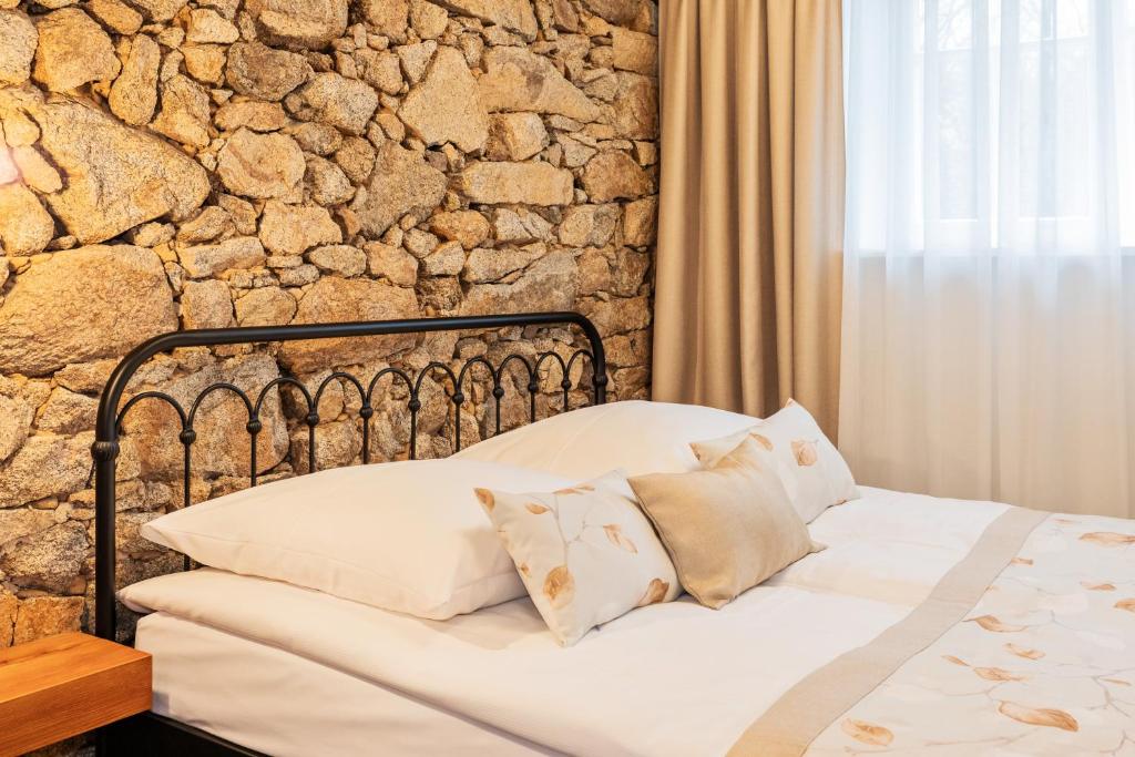 Postel nebo postele na pokoji v ubytování Hotel Zum Pfeiffer