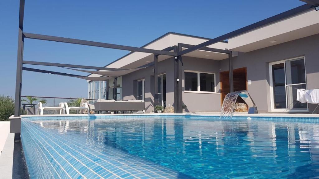 Πισίνα στο ή κοντά στο Villa Arres