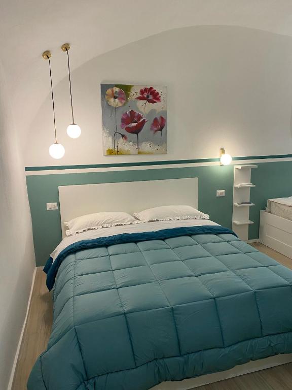 Postel nebo postele na pokoji v ubytování La Borbona Ercolano