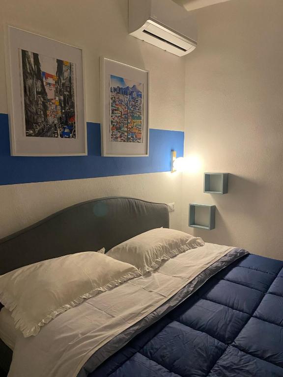 Postel nebo postele na pokoji v ubytování La Borbona Ercolano