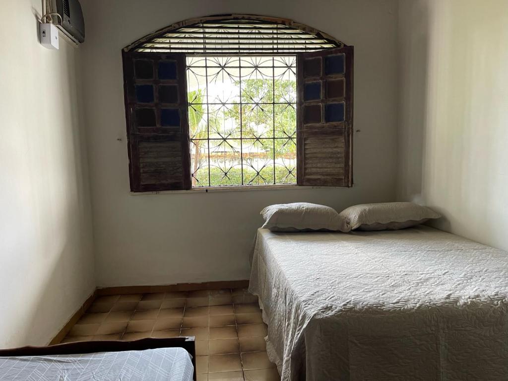 Ліжко або ліжка в номері Casa Relaxante