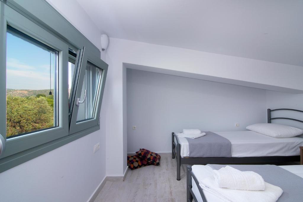 Postel nebo postele na pokoji v ubytování Terra di Olive Thassos