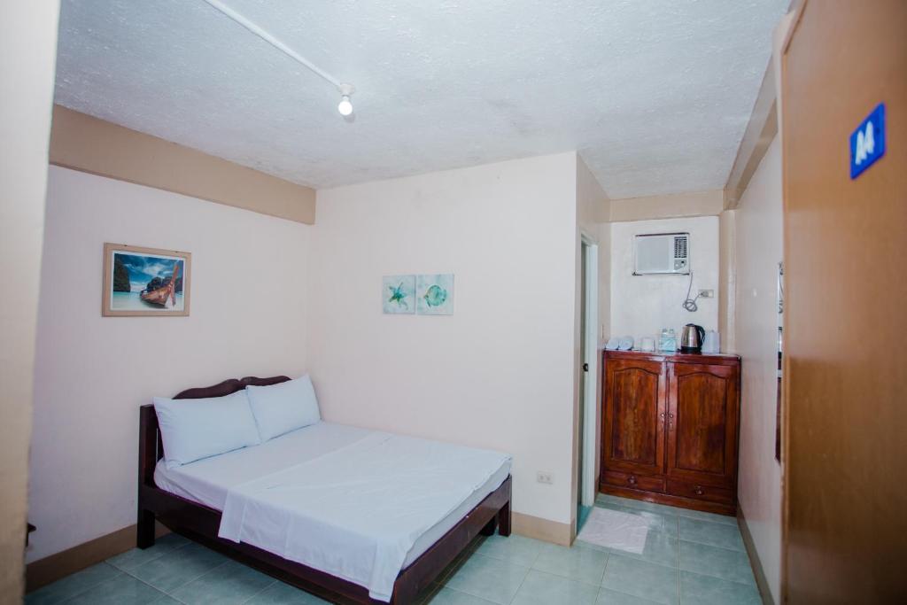 Postel nebo postele na pokoji v ubytování Durhan White Beach Resort powered by Cocotel
