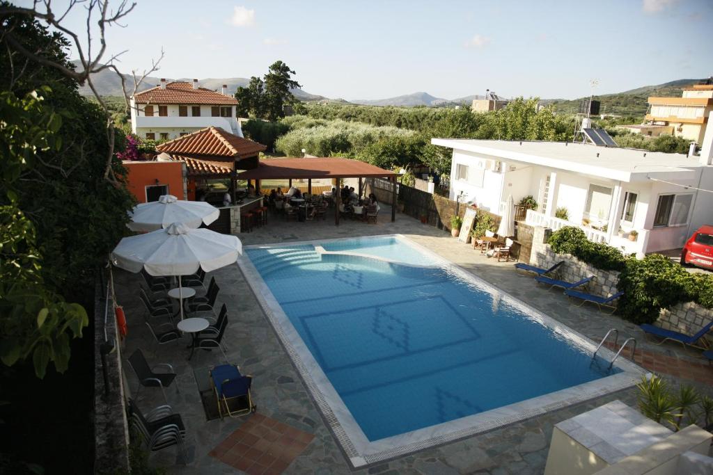 an overhead view of a swimming pool in a house at Kalliopi Hotel in Kastéllion