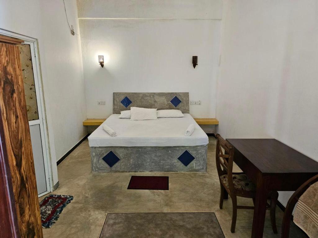 Postel nebo postele na pokoji v ubytování Unawatuna Backpacker Lodge