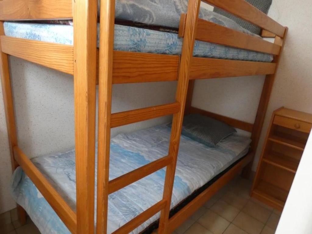 Posteľ alebo postele v izbe v ubytovaní Maison 5 pers avec cour, près de la plage et commerces, animaux acceptés - FR-1-540-222