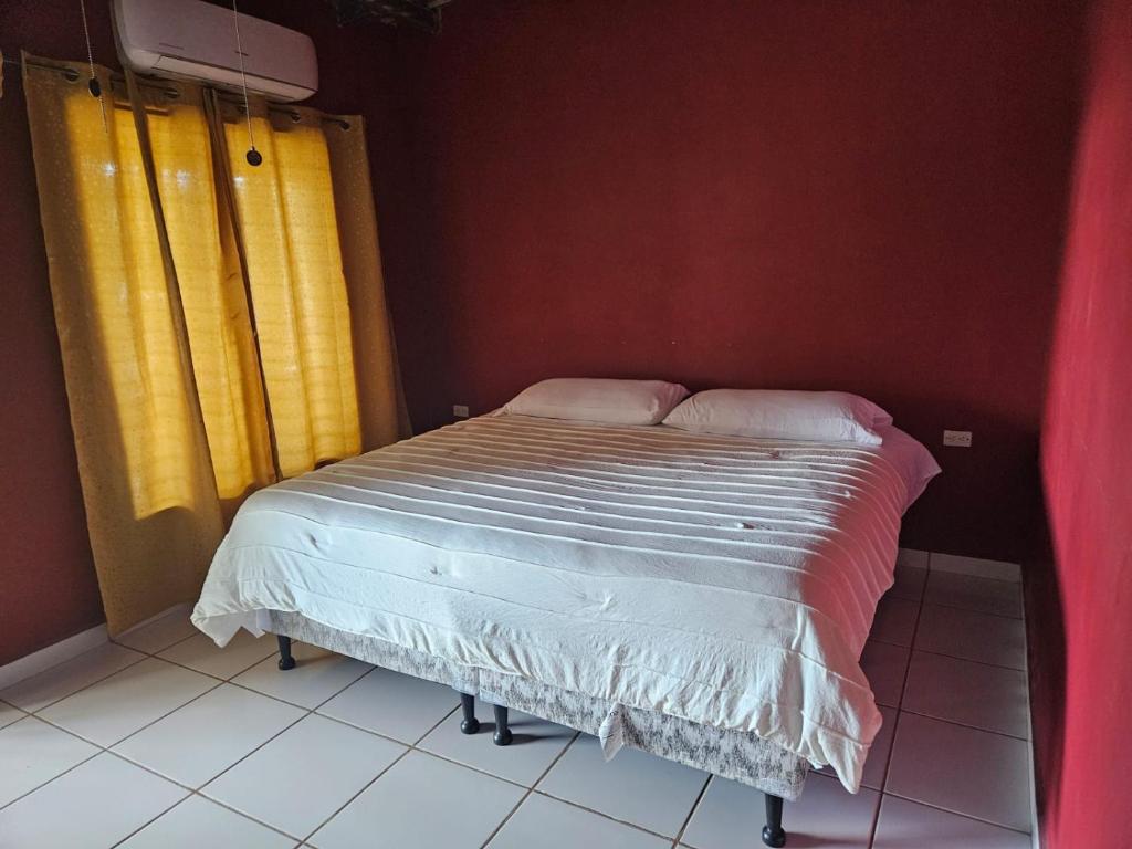 Postel nebo postele na pokoji v ubytování Aparta Hotel Palmerola