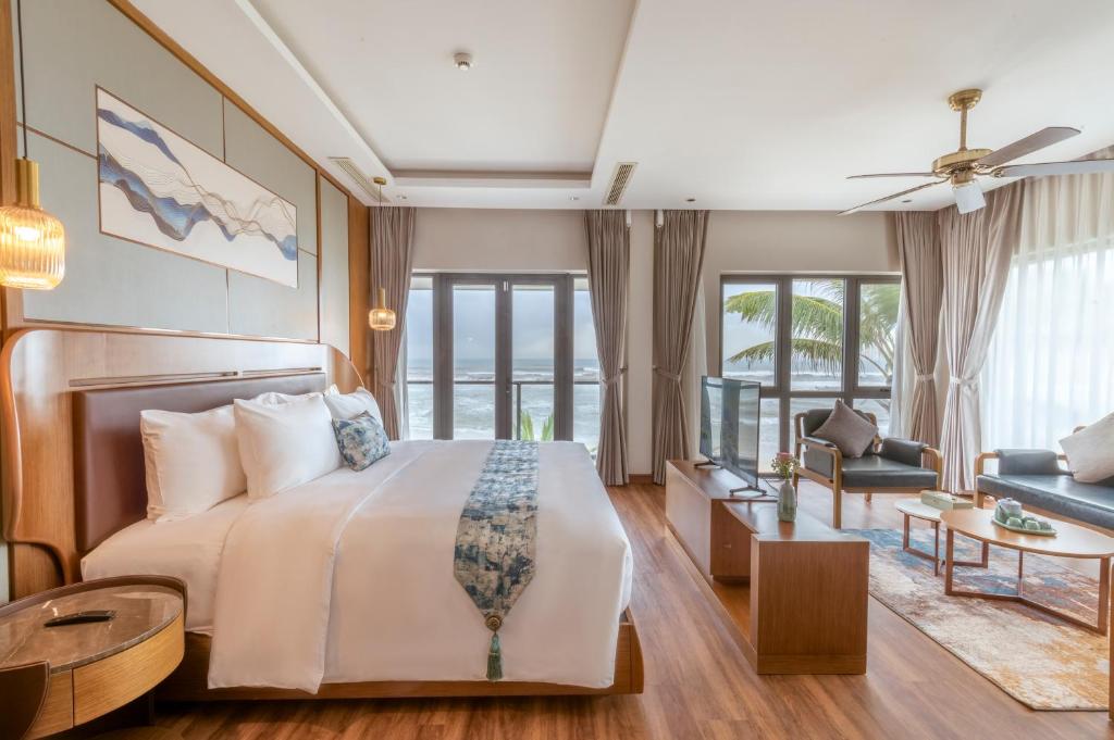 Postel nebo postele na pokoji v ubytování KOI Resort & Residence Da Nang