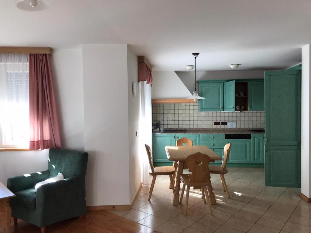 Kuchyň nebo kuchyňský kout v ubytování Appartamenti Residence Rodolon