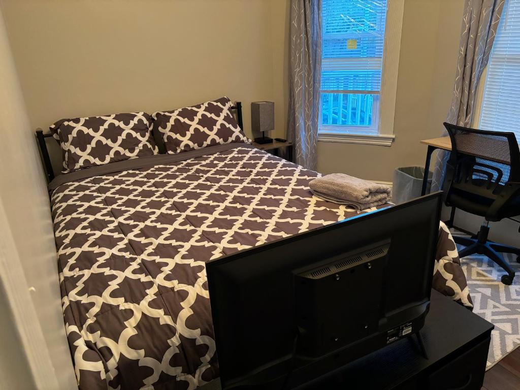 Postel nebo postele na pokoji v ubytování HomeStay B&B in Boston - 3 locations in Dorchester
