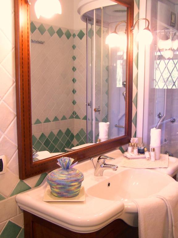Koupelna v ubytování Hotel Club Ragno D'oro