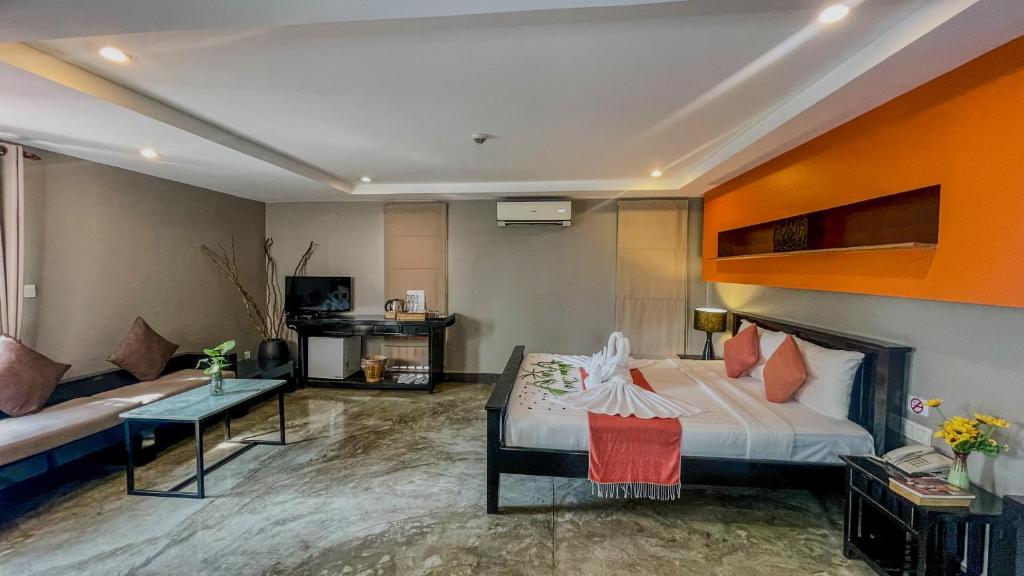 TV a/nebo společenská místnost v ubytování Dusit Hotel Siem Reap