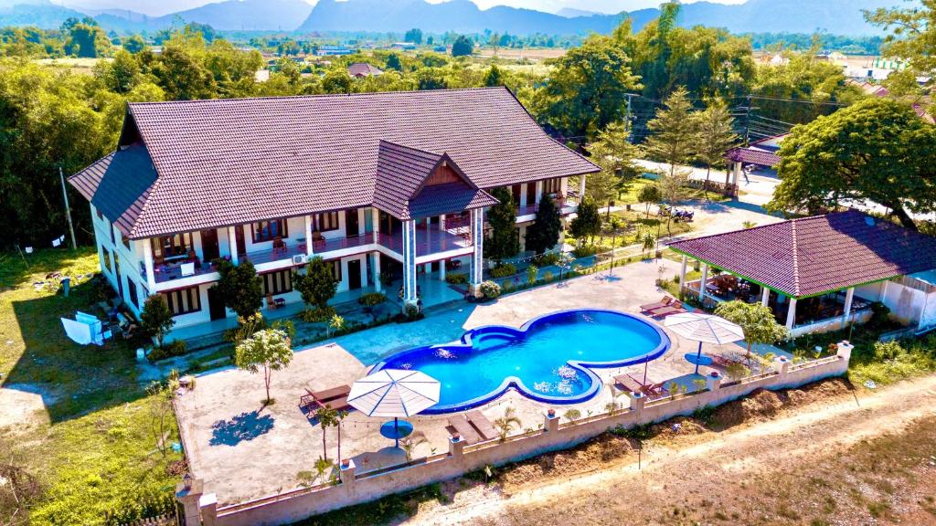 an aerial view of a house with a swimming pool at Vang Vieng Garden Resort in Vang Vieng