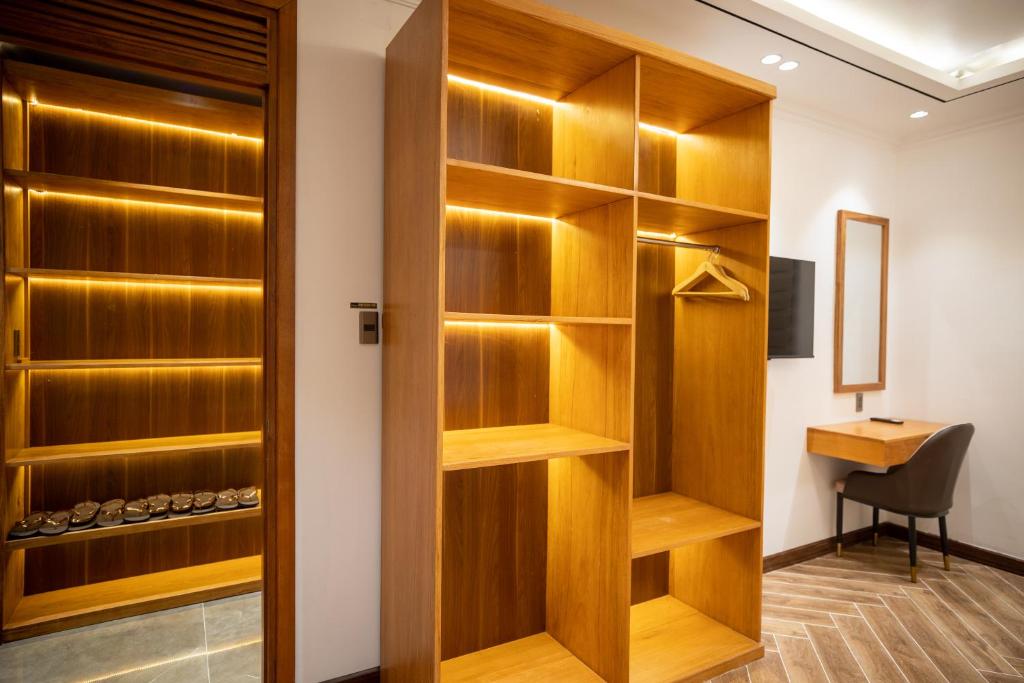 TV a/nebo společenská místnost v ubytování La Fleur Premium Central Apartment Hotel