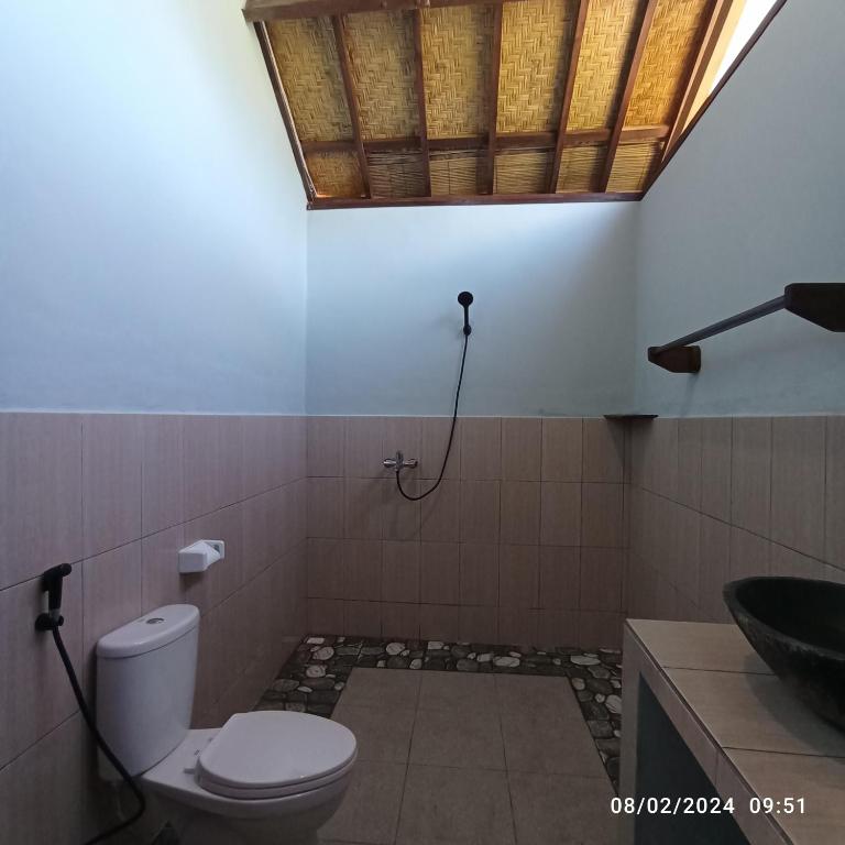 Koupelna v ubytování Tangga Bungalows Gili Air