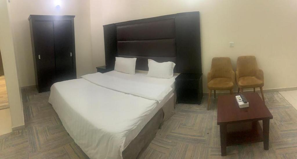 Krevet ili kreveti u jedinici u okviru objekta حكاية ليل للشقق الفندقية