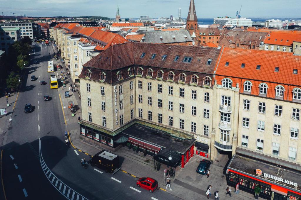 an overhead view of a city street with buildings at Milling Hotel Ritz Aarhus City in Aarhus