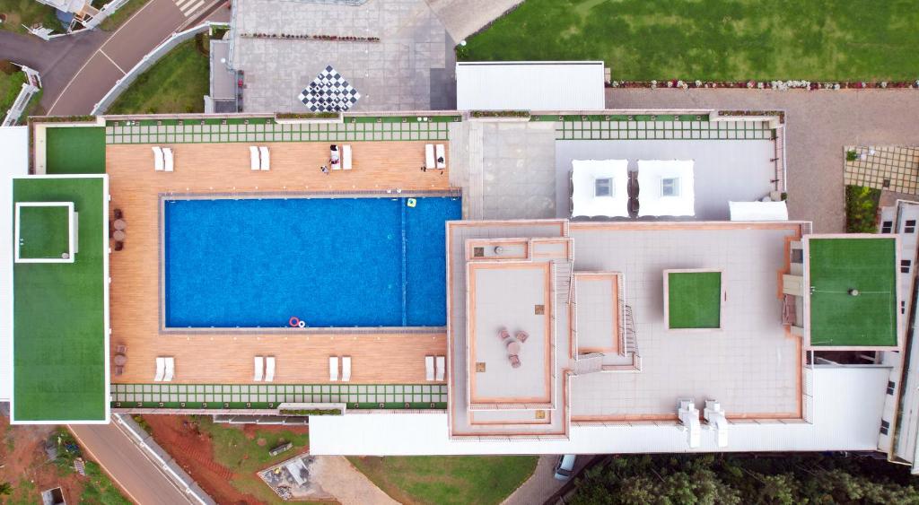 Bazén v ubytování Vibe Munnar Resort & Spa nebo v jeho okolí