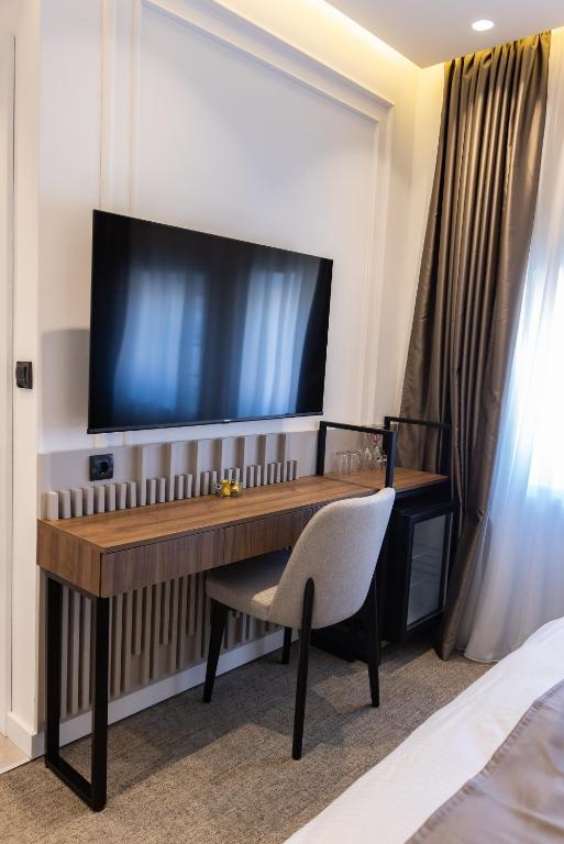 TV a/nebo společenská místnost v ubytování RIVA sleep & chill