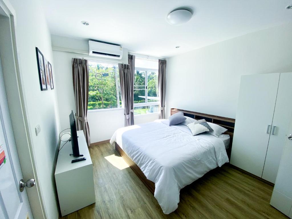 Ένα ή περισσότερα κρεβάτια σε δωμάτιο στο Townhome in Town