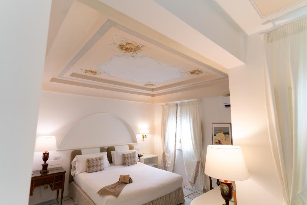 Postel nebo postele na pokoji v ubytování Masseria Il Melograno