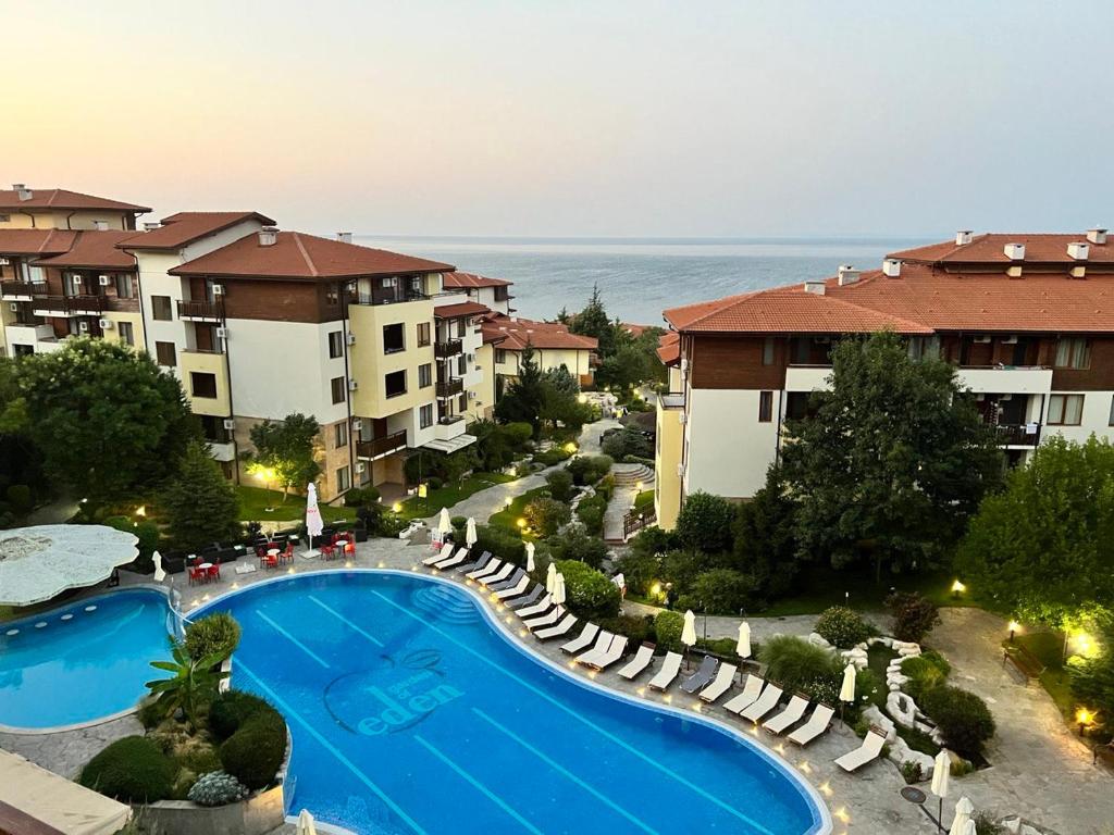 an aerial view of a resort with a swimming pool at Kalina Apart in Sveti Vlas