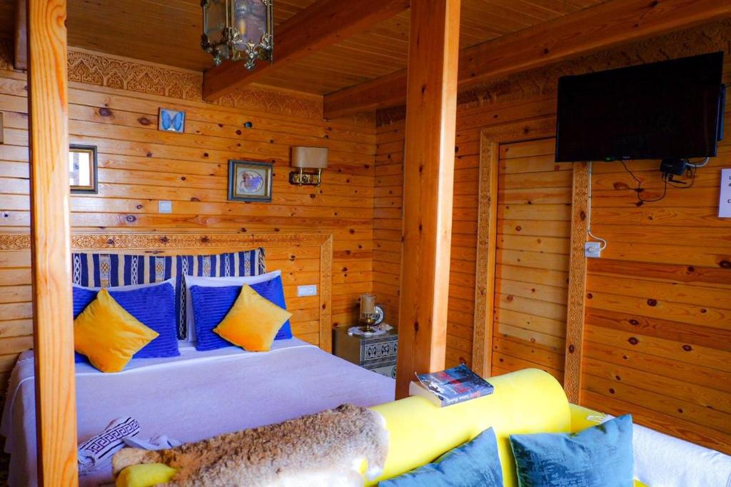 Postel nebo postele na pokoji v ubytování Dar Lalhambra