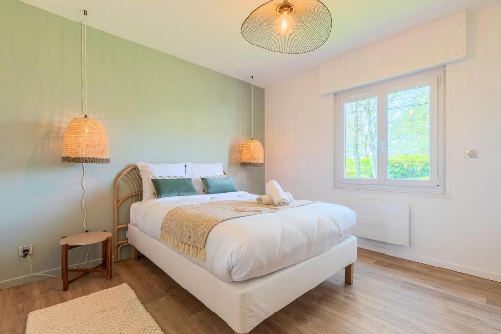 Posteľ alebo postele v izbe v ubytovaní Bright and renovated house for 8 people parking
