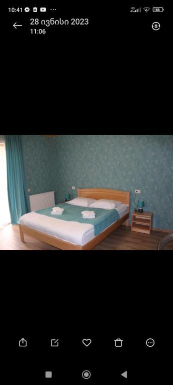 Postel nebo postele na pokoji v ubytování Margiansha House მარგიანშა სახლი
